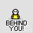 Pixel art animation of two yellow-shirted figures with white heads, one behind the other, displaying sequential poses and text "BEHIND YOU!" below.