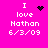 Bright pink background displays four identical text blocks with 'I love Nathan 6/3/09' and varying pixelated symbols above 'I'.