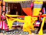 Three distinct scenes from a historical video game display characters in traditional attire with yellow fabric and red clothing, featuring the text "TwinCrew" at bottom.