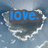 Heart-shaped cloud background with blue text reading 'love. what is it anyway' appearing sequentially