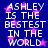 Blue background with white text reading 'ASHLEY IS THE BESTEST IN THE WORLD' and pink star shapes scattered throughout.