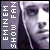 four and four shows a person with earphones, each containing vertical text reading 'EMINEM SHOW FAN' on the left side