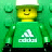 Pixelated green LEGO-style character wearing a white cap and green shirt with a white logo on chest, set against solid green background.