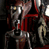 Static pixelated image of a character in red and silver armor with glowing yellow accents, likely from Star Wars media.