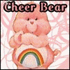 Pink Care Bear with rainbow emblem on chest, arms raised in cheer pose against pink patterned background.