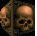 Pixelated skull icons on a dark background, arranged in two with varying head positions and angles