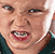 Pixelated image of a person with mirrored facial features, hands pressed against the face in a distorted expression.