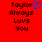 Red background with black pixelated text reading "Taylor Always Luvs You" and a blue heart symbol replacing the 'o' in Taylor.