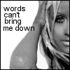 Black-and-white image of a person with long hair holding their hand near their head, with text reading 'words can't bring me down' on the left side.