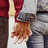 A split-screen buddy icon with a pixelated image of two people holding hands on the left and white text reading "Your Hands Are Mine To Hold" on a blue background on the right.