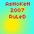 Red pixelated text 'AsHoKeN 2007 RuLeD' on a cyan-to-yellow gradient background with subtle circular light effects.