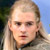Static 50x50 pixel icon showing a close-up of a person with light-colored hair against an outdoor background, rendered in low-resolution pixel art style.