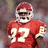 Pixelated image of a football player in a red uniform with white number 17, wearing a red and white helmet, standing against a blurred background.