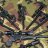Static pixelated image with indistinct shapes and muted earth tones including brown, green, purple, and beige.