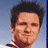 Pixelated image of a person with dark hair against light blue background, surrounded by pink text and heart symbols on black.