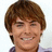 A pixelated image of a person with brown hair and a light-colored shirt, next to a bright pink background with white text.
