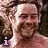 A 4-frame animated contact sheet showing a person with curly hair in various poses and expressions, accompanied by text elements including "i", "wild", "boyz", and a pink heart symbol across the frames.