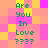 Pixelated text 'Are You In Love ????', green on a of pink, yellow, and orange squares