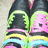 six colored squares with text and symbols; leftmost square shows pixelated sneakers on a light surface