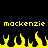 Yellow pixelated text 'mackenzie' repeated twice above a of yellow flame shapes on black background