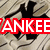 A pixelated image with a striped background and black silhouettes, displaying text in red and blue blocks that reads 'YANKEE ALL THE WAY'