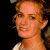 Pixelated image of a person with light brown hair and a pearl necklace on the left, next to green text reading 'Original Icons .com' on a dark background.