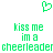 Green pixelated heart icon above text reading 'kiss me im a cheerleader' in two identical horizontal lines on white background.