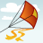Pixelated kite with orange body and yellow accents, gray strings extending leftward, trailing yellow streamers against light blue sky with white clouds.