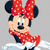 Pixelated image of Minnie Mouse with red polka-dot bow and scarf, standing against gray background next to bold red text reading 'minnie mouse!' on white.