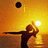 Silhouette of a person playing volleyball at sunset with text changing from 'i' to 'love' and then 'VOLLEYBAL'