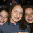 A collage of four group photos with a blue displaying yellow text reading "I love camp!!!" on the right side