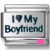 A contact sheet of eight animated AIM buddy icons showing variations in heart color on a silver rectangular frame with "I ❤️ My Boyfriend" text.