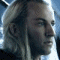 Pixelated profile image of a person with long light hair against a bright background, next to golden text reading 'Haldir' on a dark backdrop.