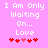 Pixelated text on pink background with red hearts, showing animation where one heart changes color.