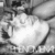 A grayscale pixelated image with a bright central area surrounded by darker, irregularly shaped regions.
