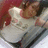 A pixelated static image shows a person with light skin and brown hair lying on their back, wearing a white top against a red background.