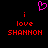 Pixelated pink heart symbol above red text reading 'i love SHANNON' on black background.