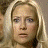 A 48x48 pixel buddy icon split into two sections: a left-side portrait of a blonde woman with neutral expression and right-side green text on dark background reading "Original Icons .com".