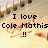 Pixelated image with black text reading "I love Cole Mathis !!" over a light beige background with brown and red pixel clusters.