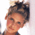 A static image shows a person with light brown hair tied up in a messy bun on the left, and green text reading 'Original Icons .com' on a dark green background to the right.