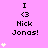 Pixelated pink background with repeated 'I <3 Nick Jonas!' text and white heart symbols in a