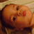A baby's face appears in four positions with slight variations in head angle and eye direction across the sequence
