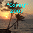 Pixelated sunset beach scene with palm trees and ocean, overlaid with cyan text reading "Corey" 2007 wantschool to go slow this year.