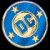 Circular blue icon with gold 'DC' letters on a crescent moon, surrounded by five yellow stars, attached to a purple and gray vertical handle.