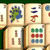 Static image of four mahjong tiles arranged in a 2x2 grid with beige backgrounds and brown borders, showing various symbols and numbers.