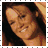 Four pixelated portrait views of a woman with long brown hair showing different expressions and angles against varied backgrounds.
