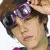 Six- of Justin Bieber images with varied poses, clothing, and text elements including 'JB' and 'I ❤️ C' on a gray background