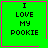 Four identical green squares with pink borders display "I LOVE MY POOKIE" text; top-right square has a pink heart, bottom-right has a pink star.