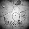 Black-and-white image with cracked texture, heart outline containing 'I'm not a perfect person' text, and a small dark shape at the heart's bottom.