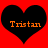 Two black heart shapes on a red background with the name Tristan in orange pixelated text inside each heart.